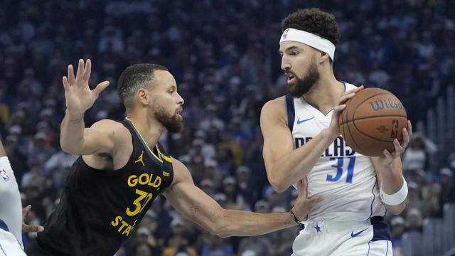 Dallas Mavericks guard Klay Thompson and Golden State Warriors guard Stephen Curry 