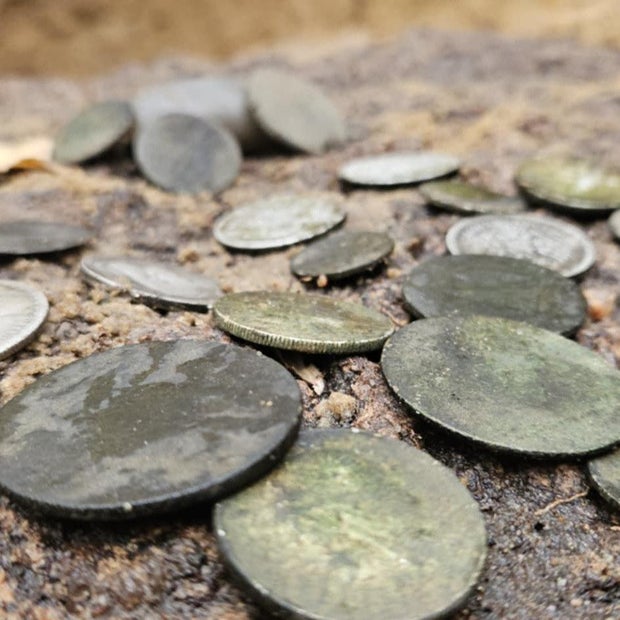 Archaeologists find ancient treasures near grave of WWII soldier in Poland