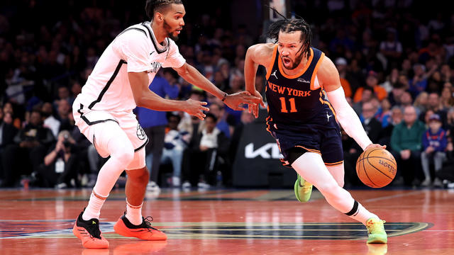 Jalen Brunson #11 of the New York Knicks dribbles the ball against Ziaire Williams #1 of the Brooklyn Nets during the fourth quarter at Madison Square Garden on November 15, 2024 in New York City. 