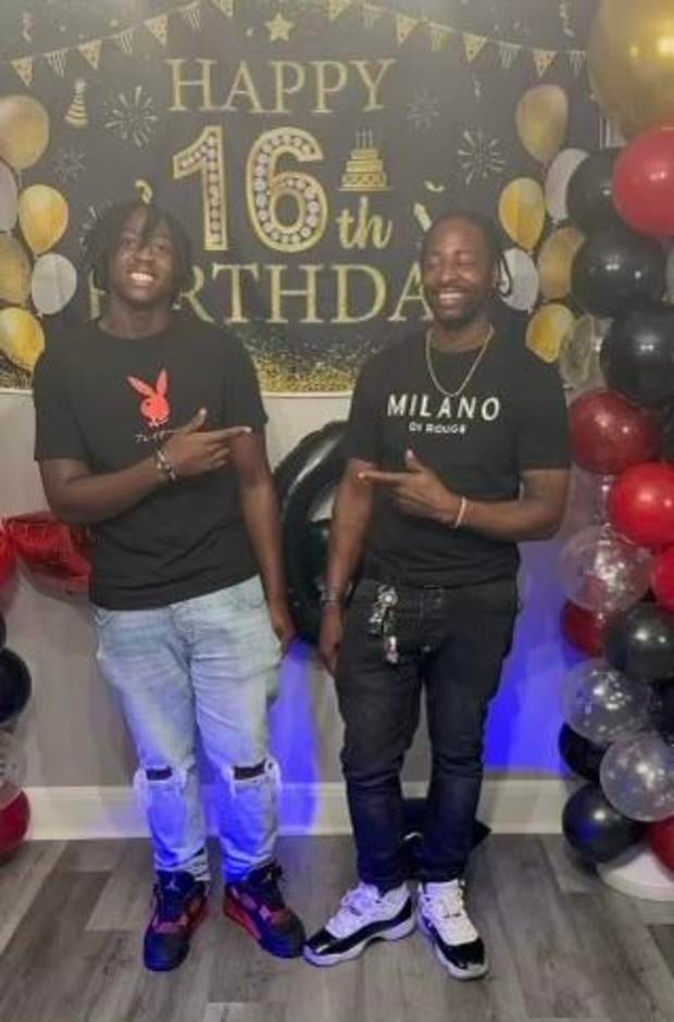 Ronald Silver II with his son at his 16th birthday party. 