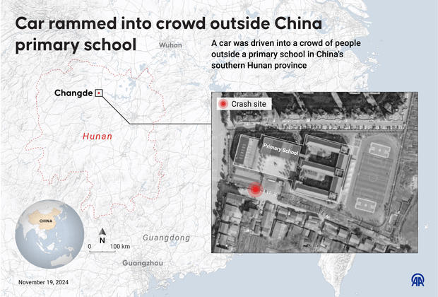 Car rammed into crowd outside China primary school 