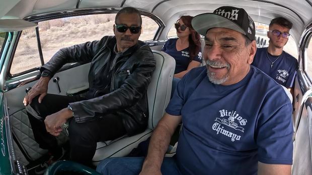 Bill Whitaker and Eppie Martinez in a Chevy Bel Air 