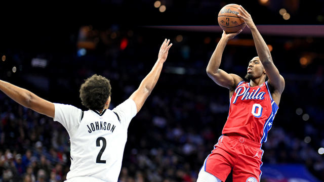 Tyrese Maxey #0 of the Philadelphia 76ers shoots the ball over Cameron Johnson #2 of the Brooklyn Nets in the first quarter of the Emirates NBA Cup game at the Wells Fargo Center on November 22, 2024 in Philadelphia, Pennsylvania. 