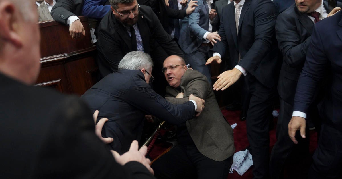 Lawmakers brawl in Serbia parliament amid accusations over train station roof collapse that killed 15 people