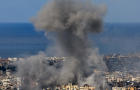 Smoke billows over Beirut's southern suburbs after Israeli strike, as seen from Baabda 