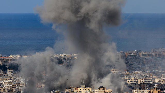 Smoke billows over Beirut's southern suburbs after Israeli strike, as seen from Baabda 