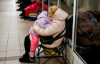 People take shelter inside a metro station during a Russian military attack, in Kyiv 