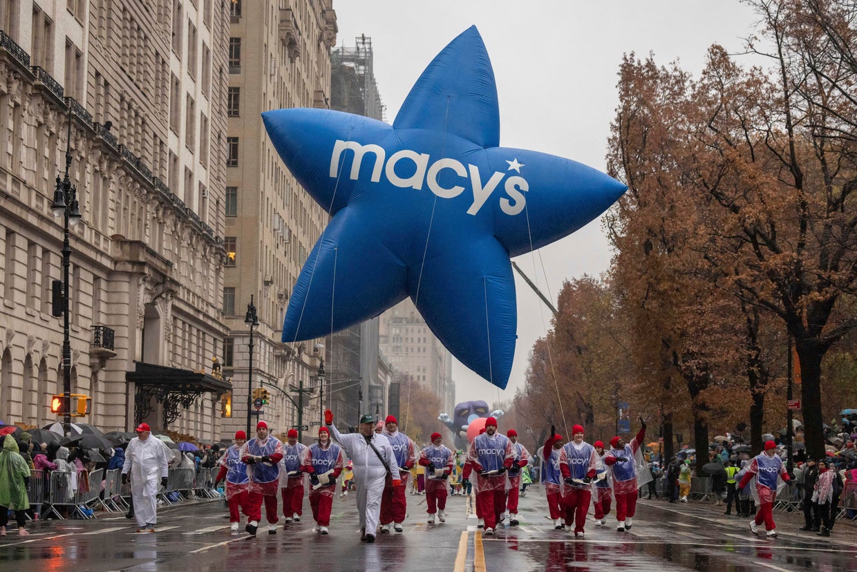 Macy's Thanksgiving Day Parade marches on despite protest and dreary