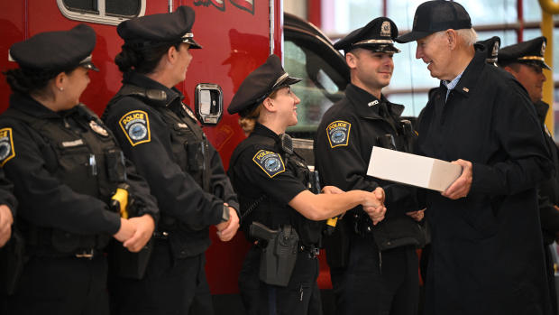 President Biden greets police officers at the Nantucket Fire Department on Nov. 28, 2024. 