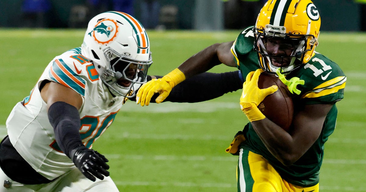 Love connects with Reed on 2 touchdowns as Green Bay Packers use fast start to beat Miami Dolphins 30-17 Love connects with Reed on 2 touchdowns as Green Bay Packers use fast start to beat Miami Dolphins 30-17