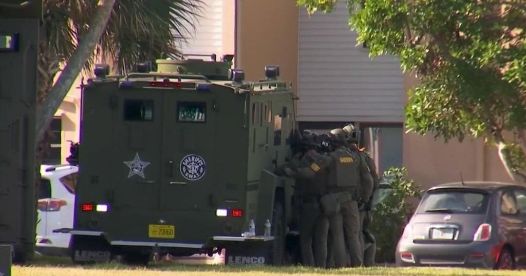 Florida SWAT sniper kills man who fired 200 shots at homes