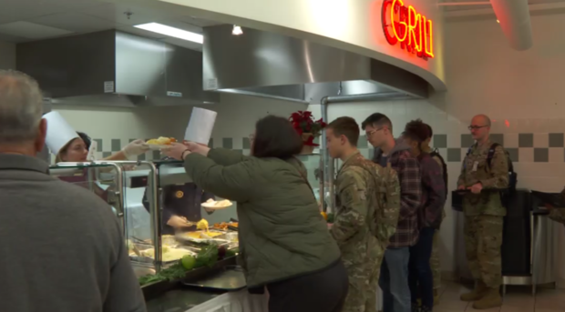 Senior military leaders at Fort Meade served Thanksgiving dinner to service members. 