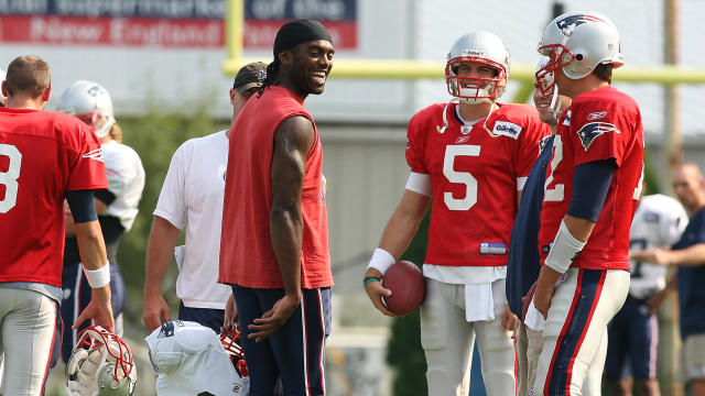 (081609 Foxboro, MA) New England Patriots wide receiver Randy Moss joked around with quarterbacks Tom Brady, right and Kevin O'Connell as the New England Patriots practice at Gillette Stadium on Sunday, August 16, 2009. Staff Photo by Matthew West 