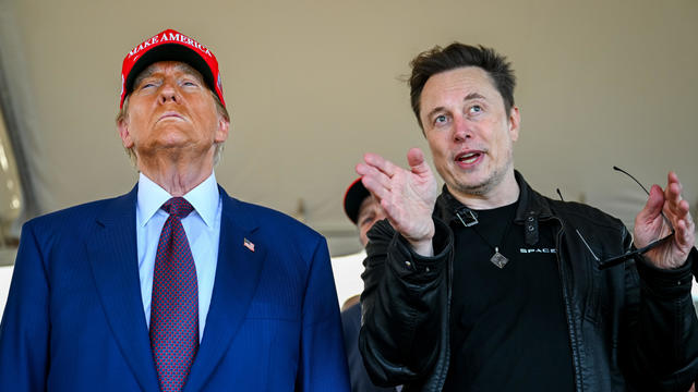 Elon Musk speaks with U.S. President-elect Donald Trump as they watch the launch of the sixth test flight of the SpaceX Starship rocket on November 19, 2024 in Brownsville, Texas. 