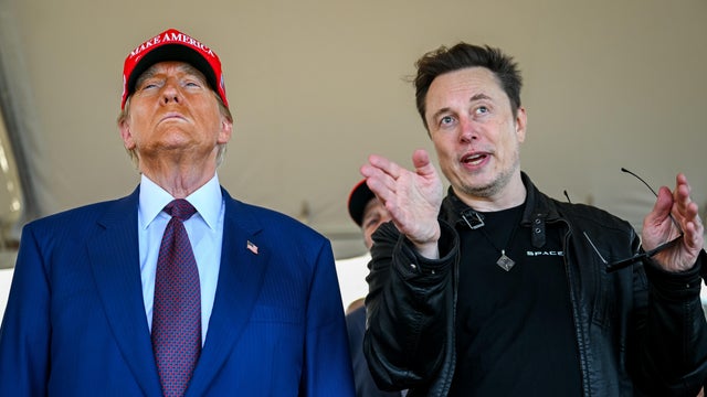 Elon Musk speaks with U.S. President-elect Donald Trump as they watch the launch of the sixth test flight of the SpaceX Starship rocket on November 19, 2024 in Brownsville, Texas.