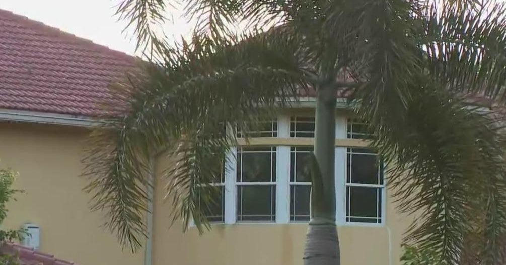 Woman pulled from Plantation house fire dies at hospital