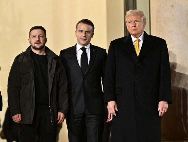 French President Emmanuel Macron (C), President-elect Donald Trump (R) and Ukraine's President Volodymyr Zelenskyy pose after their meeting at the Elysee Palace in Paris, France on December 07, 2024.