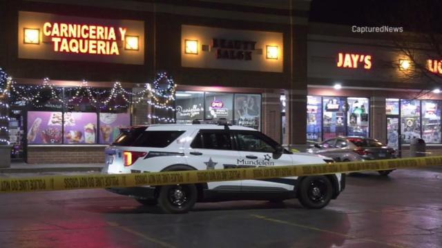 Generic police lights and yellow police tape at crime scene 