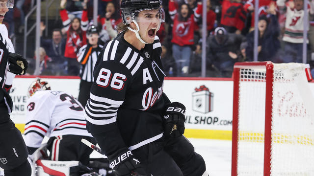 New Jersey Devils center Jack Hughes (86) celebrates after scoring a goal during a NHL game between the Chicago Blackhawks and New Jersey Devils at Prudential Center on December 14, 2024 in Newark, New Jersey. 