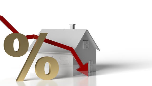 House Mortgage golden percentage symbol and falling red arrow 