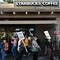 Why Starbucks and Amazon workers are striking