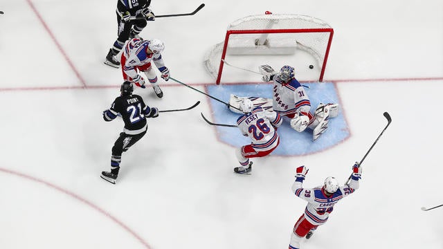 Brayden Point #21 of the Tampa Bay Lightning scores a goal against the New York Rangers at Amalie Arena on December 28, 2024 in Tampa, Florida. 