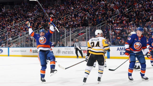 Casey Cizikas #53 of the New York Islanders celebrates his goal at 9:39 of the first period against the Pittsburgh Penguins at UBS Arena on December 28, 2024 in Elmont, New York. 