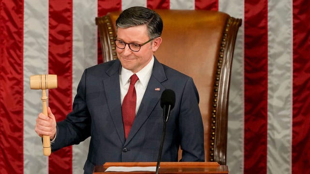 Speaker Mike Johnson holds the gavel after winning reelection in the House chamber on Friday, Jan. 3, 2025. 