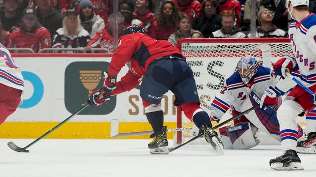 Alex Ovechkin #8 of the Washington Capitals scores a goal against Jonathan Quick #32 of the New York Rangers during the third period of a game at Capital One Arena on January 04, 2025 in Washington, D.C. This marks Ovechkin's 872nd career goal. 