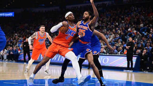 Shai Gilgeous-Alexander #2 of the Oklahoma City Thunder attempts to drive past Mikal Bridges #25 of the New York Knicks during the first half at Paycom Center on January 3, 2025 in Oklahoma City, Oklahoma. 