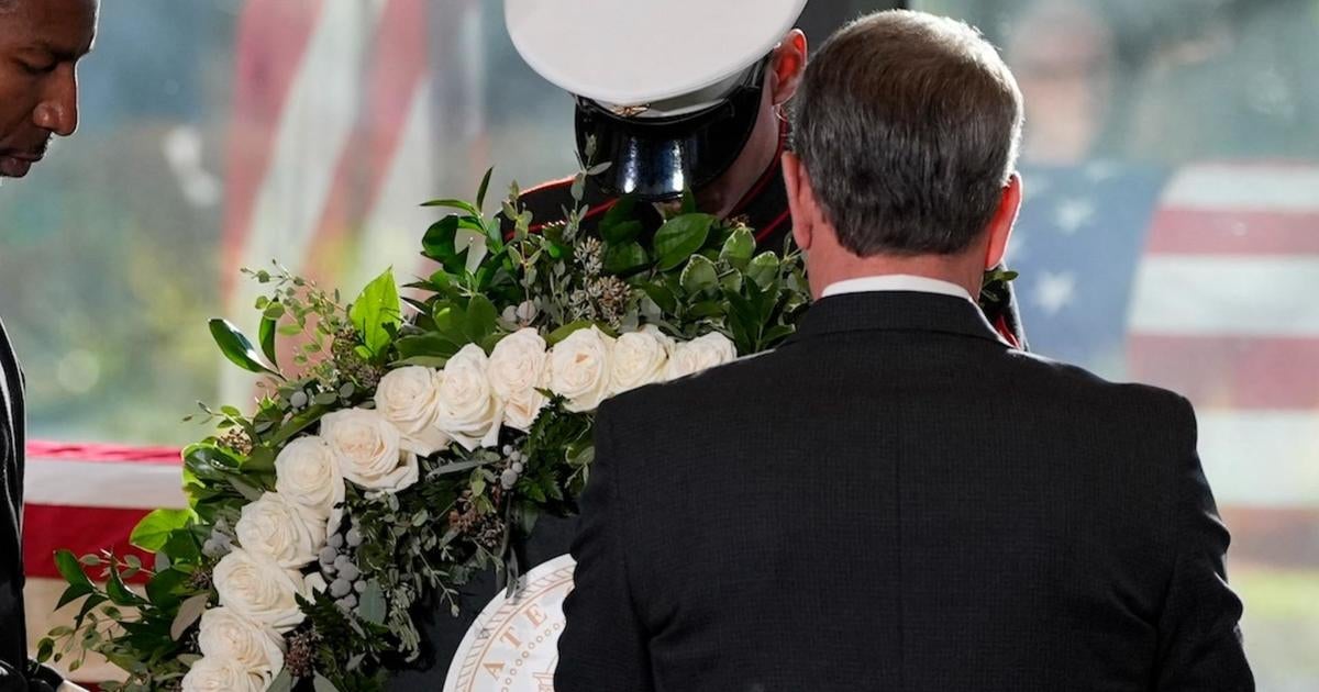 Georgia governor and Carter Center CEO lay wreaths for Jimmy Carter