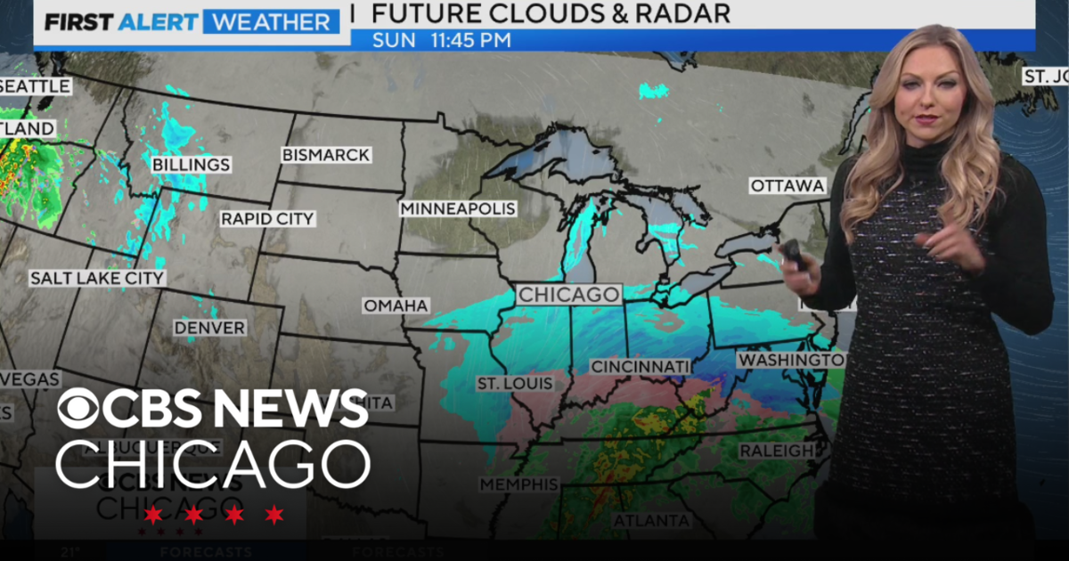 Blizzard system in Chicago area, lake effect snow spreading more widely