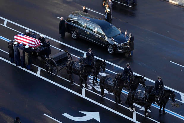 Funeral Procession Brings Body Of Former President Jimmy Carter To U.S. Capitol Building 