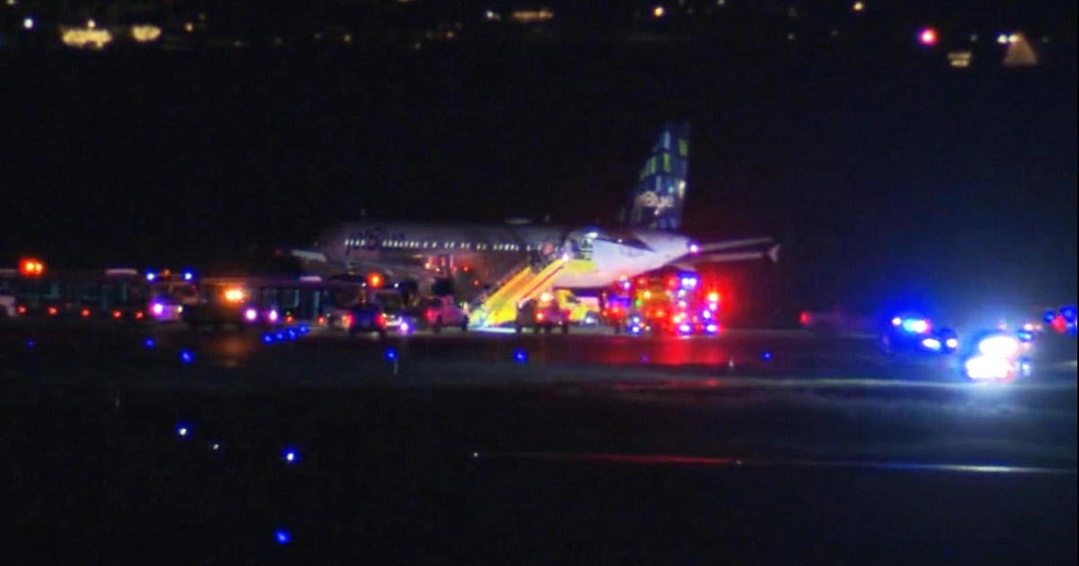 Passenger on JetBlue flight opens door, deploys slide at Logan Airport