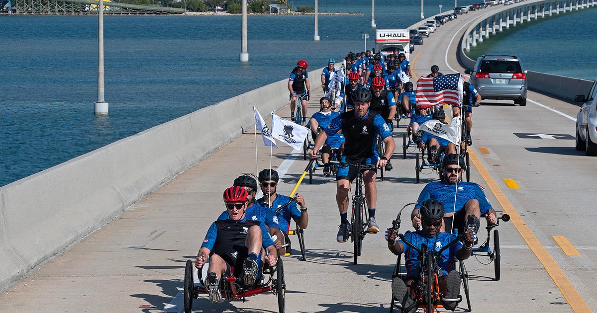 Wounded veterans cycle across Florida Keys’ Seven Mile Bridge to raise awareness, support for injured military members Wounded veterans cycle across Florida Keys’ Seven Mile Bridge to raise awareness, support for injured military members