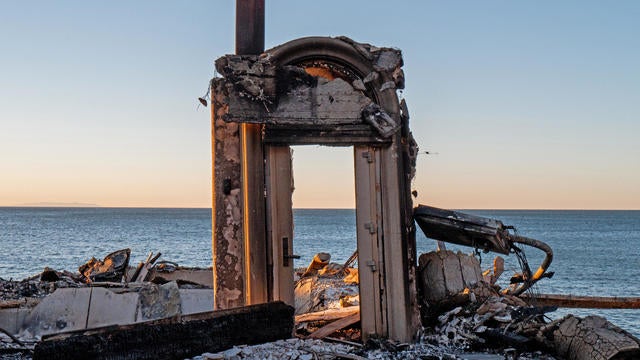 The entrance to a home destroyed by the Palisades Fire is seen on Jan. 13, 2025, in Malibu, California. 