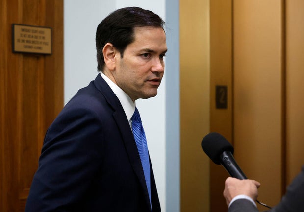Sen. Marco Rubio speaks to reporters as he leaves his office in the Dirksen Senate Office Building on Dec. 10, 2024, in Washington, D.C.