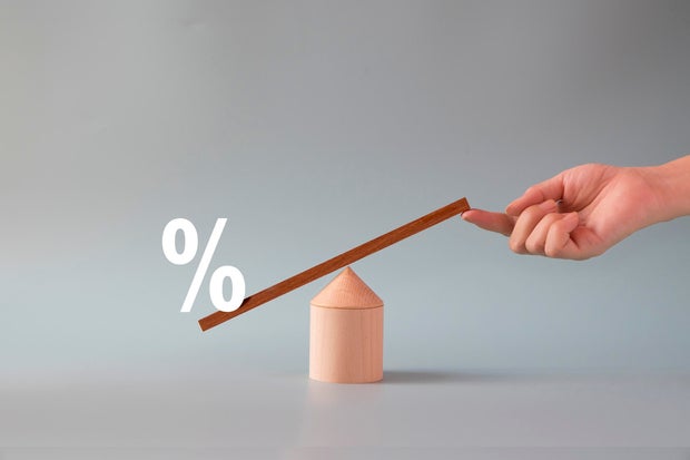 Conceptual finance or business growth trend still life with balance scale. Stock photo.