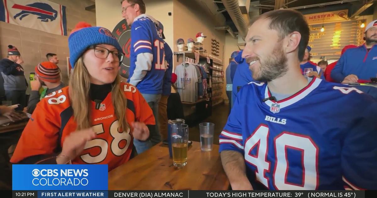 Colorado couple cheer for opposite teams during Broncos, Bills game