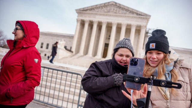 Content creators stand outside the Supreme Court during oral arguments on whether to overturn or delay a law that could lead to a ban of TikTok in the U.S., on Jan. 10, 2025, in Washington, D.C. 