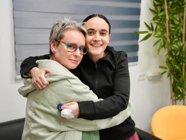 Released British-Israeli hostage Emily Damari embraces her mother, Mandy, after being held in Gaza since the deadly October 7 2023 attack by Hamas 