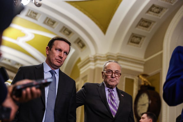 Sen. Chris Murphy of Connecticut and Senate Minority Leader Chuck Schumer of New York speak during a news conference at the U.S. Capitol in Washington, D.C., on Tuesday, Feb. 6, 2024.