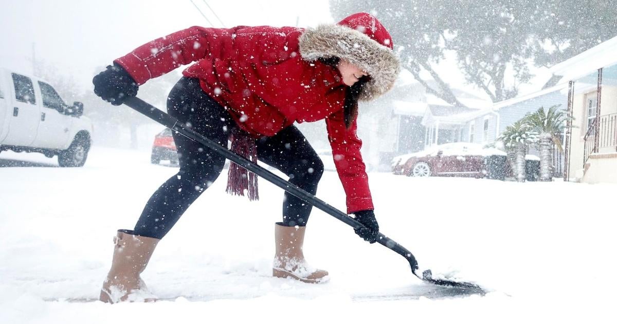 Snow and winter conditions force school and airport closures in the South