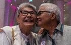 Thai LGBT couple poses for a photo during the registration 