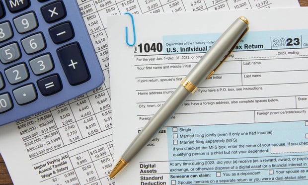 Tax form with a calculator
