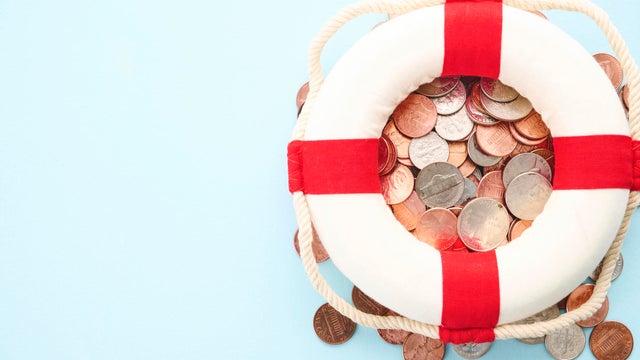 American currency beneath a lifebelt 