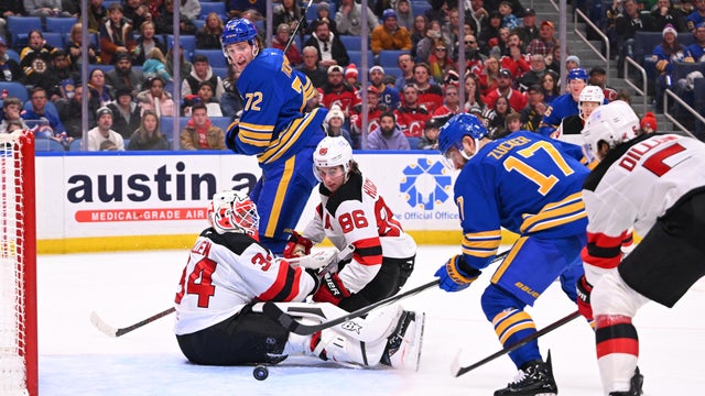 Jason Zucker #17 of the Buffalo Sabres scores a second period goal against Jake Allen #34 of the New Jersey Devils during an NHL game on February 2, 2025 at KeyBank Center in Buffalo, New York. 