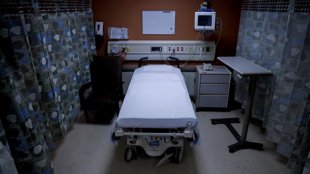 Empty hospital bed 