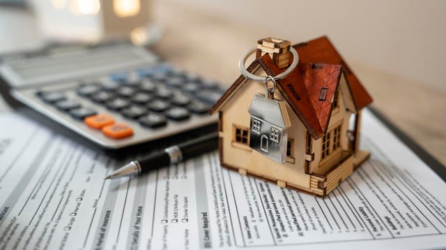 Money, pile coin with saving book and paper home,concept 