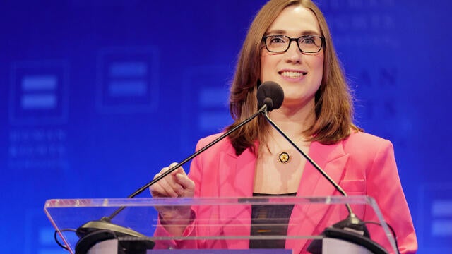 Sarah McBride speaks at a podium at a Human Rights Campaign 